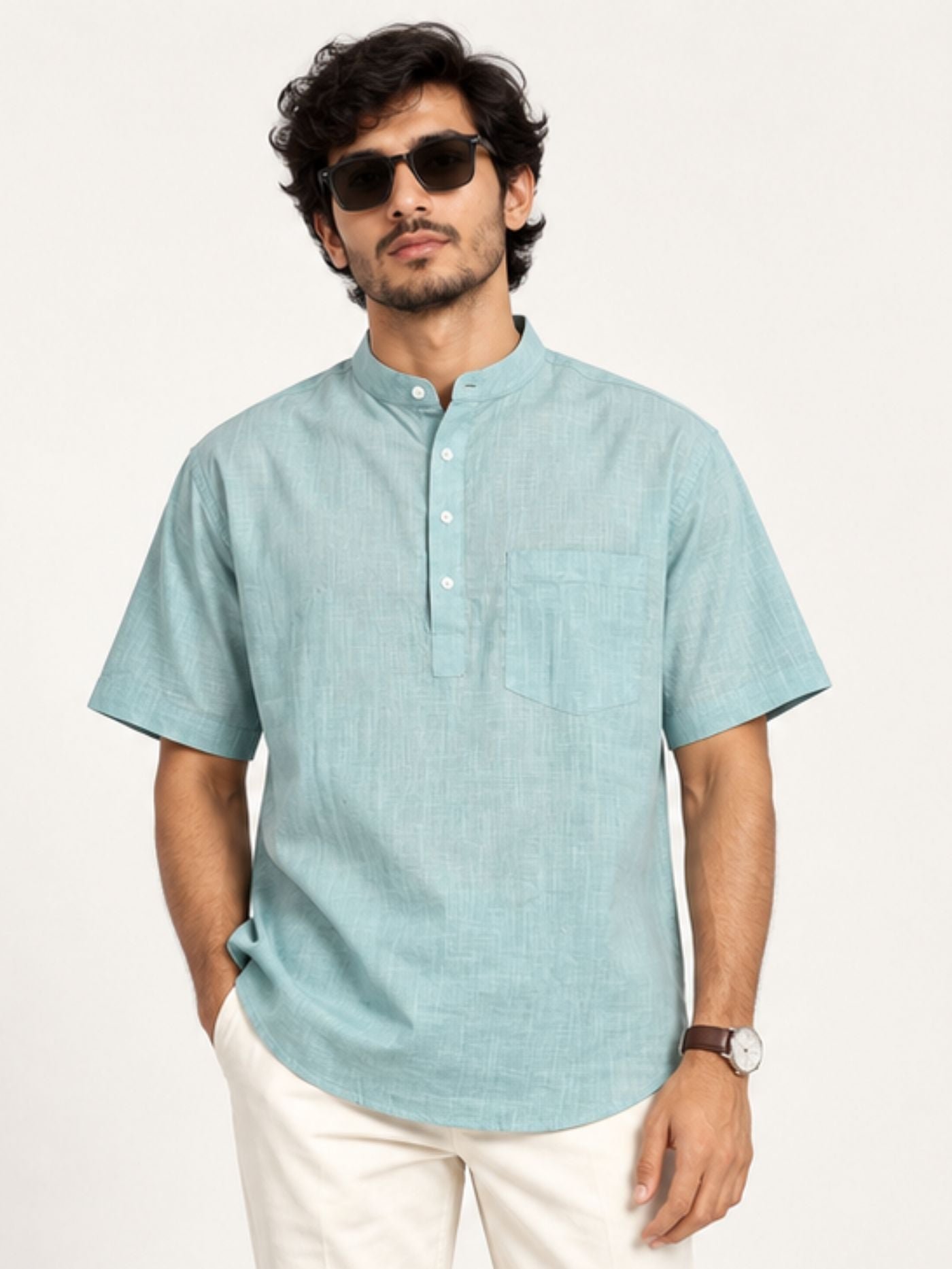 Front_view_of_Aavir_seafoam_blue_cotton_kurta_shirt_with_Mandarin_collar_half_sleeves_and_chest_pocket