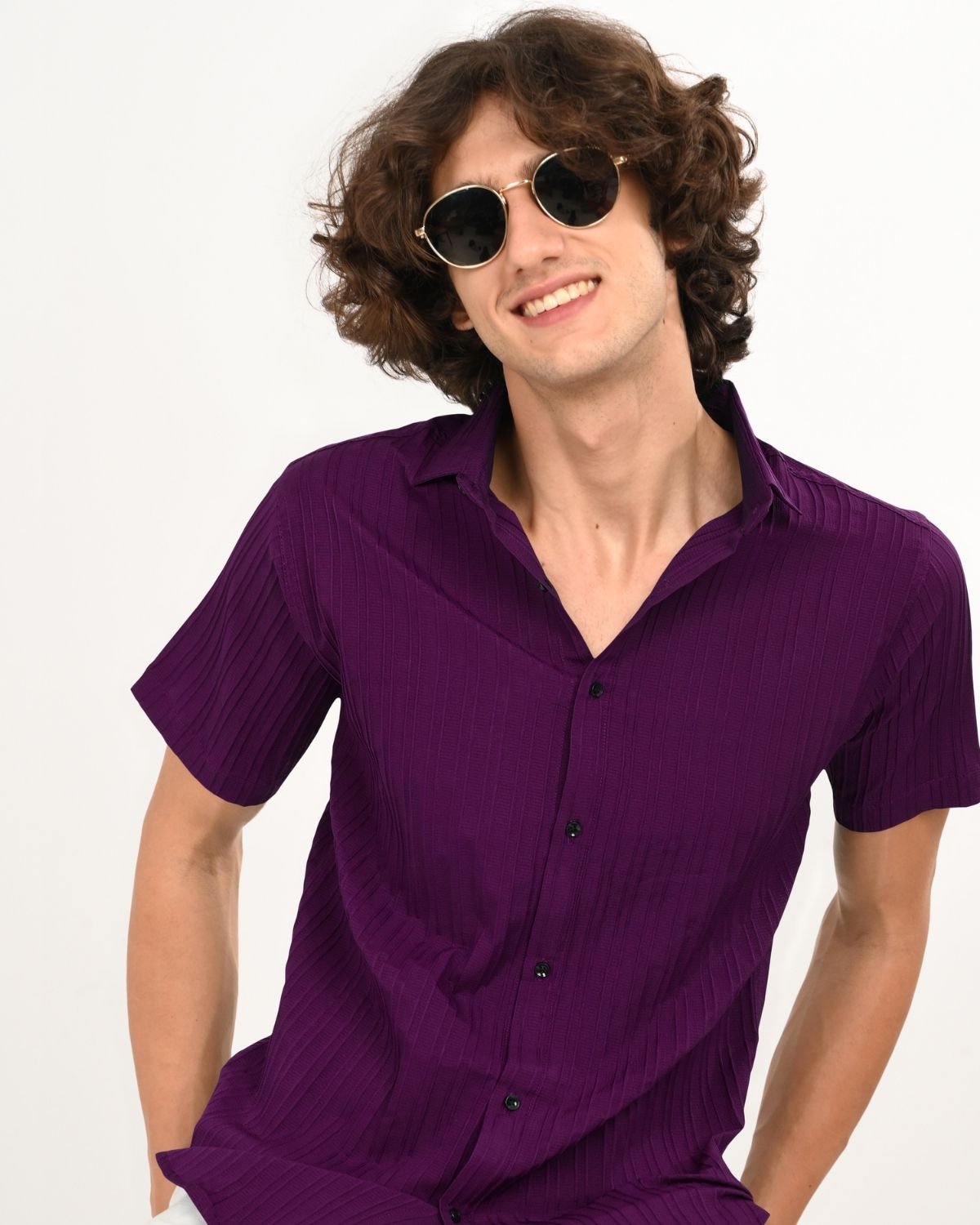 Man_smiling_in_Royal_Plum_textured_short-sleeve_shirt