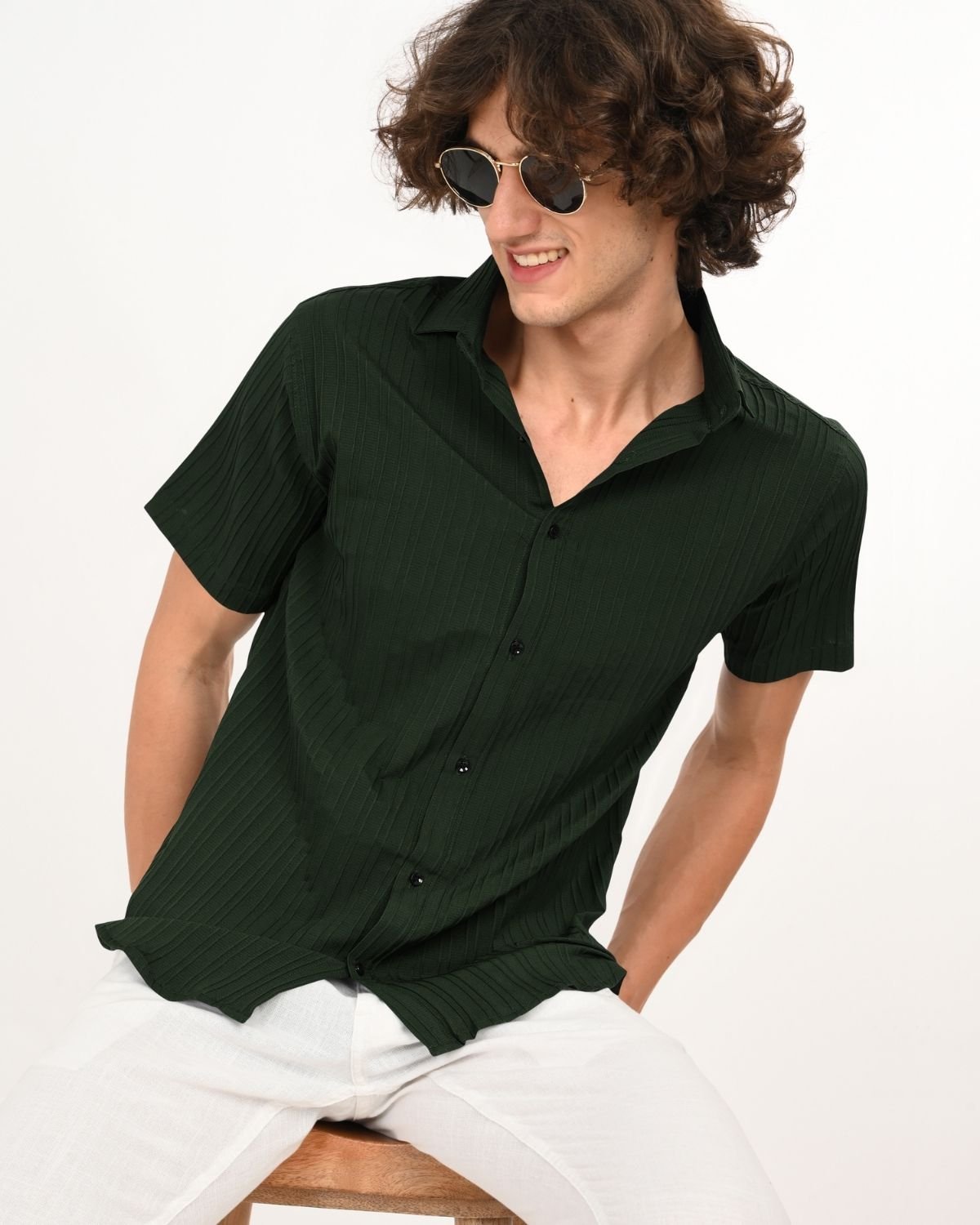 dark_green_textured_casual_shirt_and_white_pants